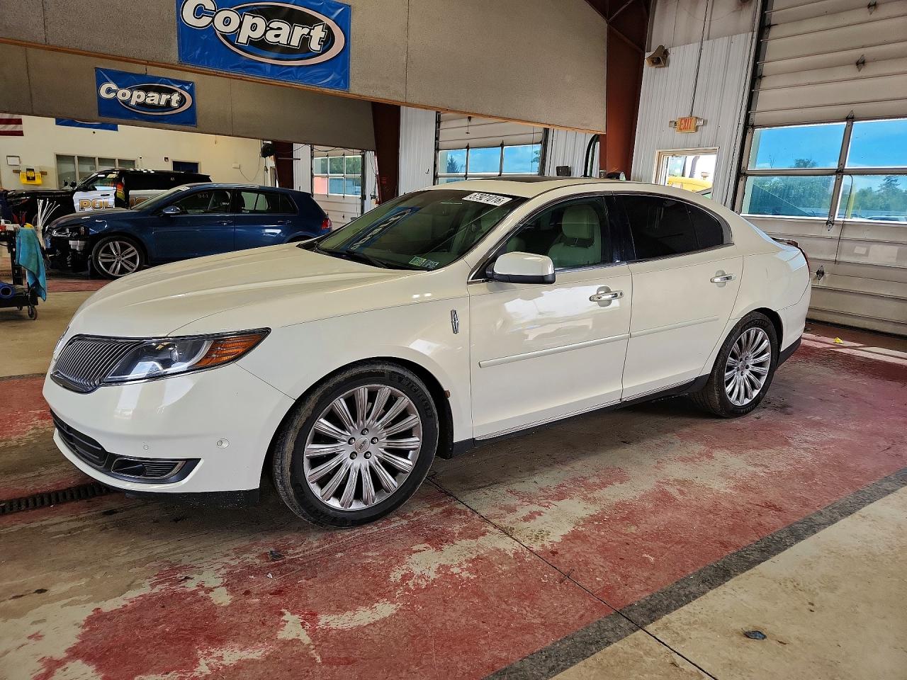 2013 Lincoln MKS, VIN 1LNHL9EK4DG612591 — Rear end