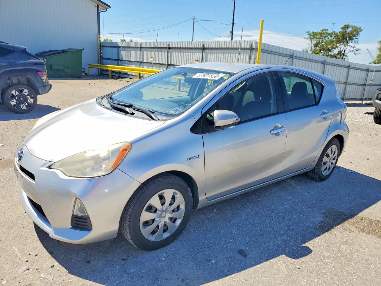 2013 Toyota Prius Two, VIN JTDKDTB37D1543948 — Side