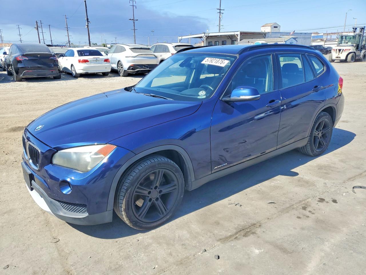 2013 BMW X1 xDrive28i, VIN WBAVL1C55DVR83595 — Front end