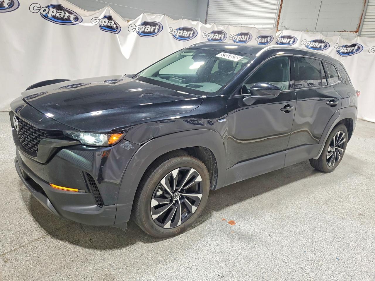 2025 Mazda CX-50 Hybrid Premium Plus Package, VIN 7MMVAAEW0SN141579 — Front end