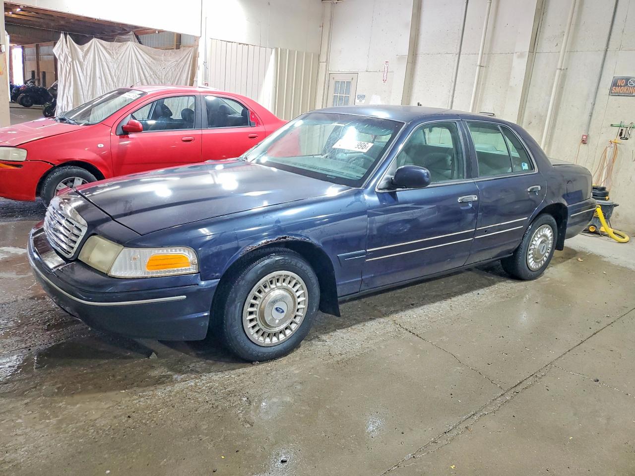 2001 Ford Crown Victoria Police Interceptor, VIN 2FAFP71W81X202109 — Side