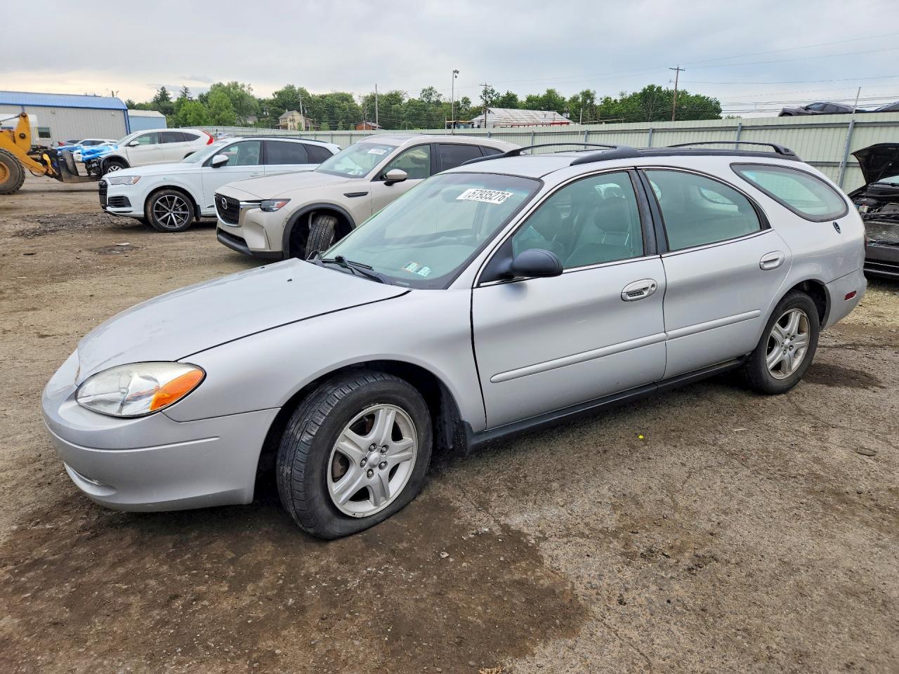 2002 Ford Taurus, VIN 1FAHP59U92A230818 — Side
