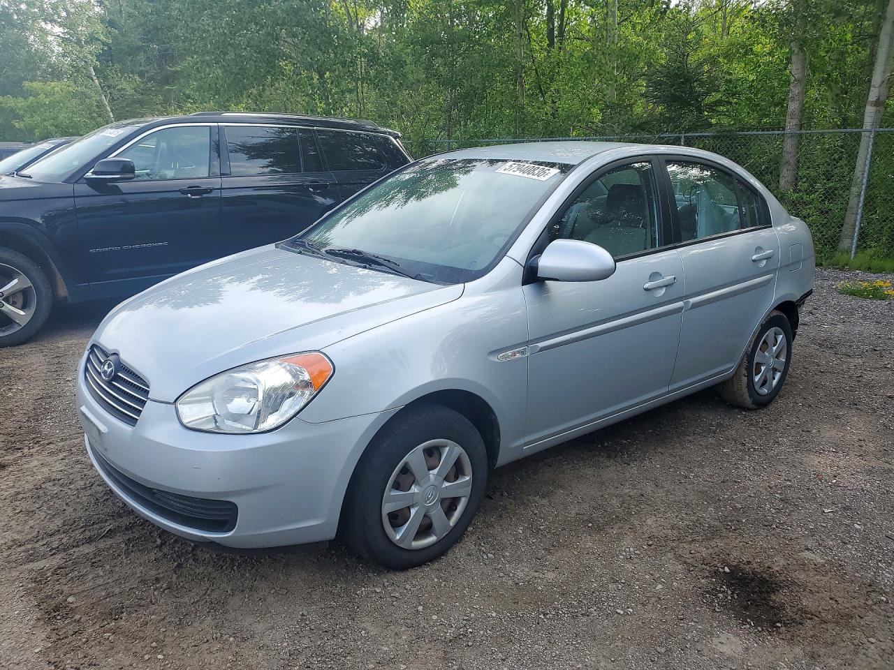 2007 Hyundai Accent GL, VIN KMHCN45C87U165706 — Зад