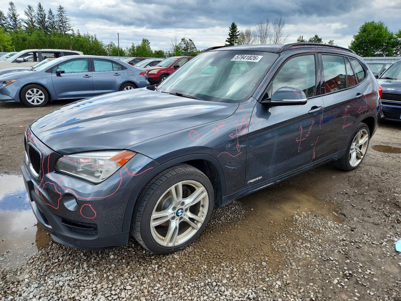 2015 BMW X1 xDrive28i, VIN WBAVL1C50FVY27483 — Side