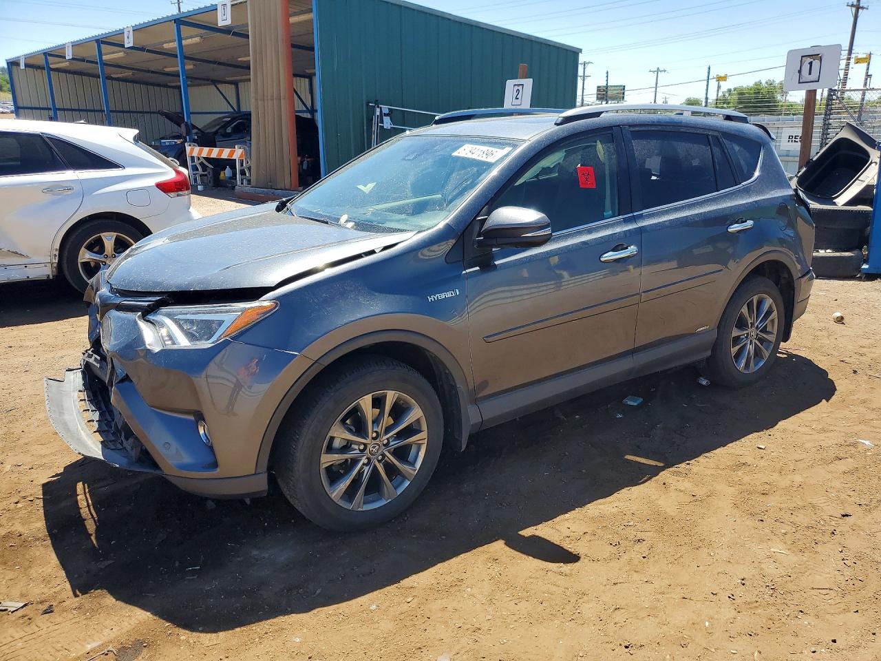 2018 Toyota RAV4 Hybrid Limited, VIN JTMDJREV7JD189053 — Rear end
