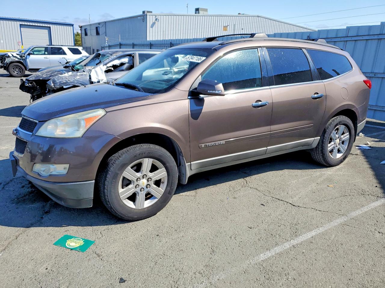 2009 Chevrolet Traverse 1LT, VIN 1GNER23D29S137861 — Side