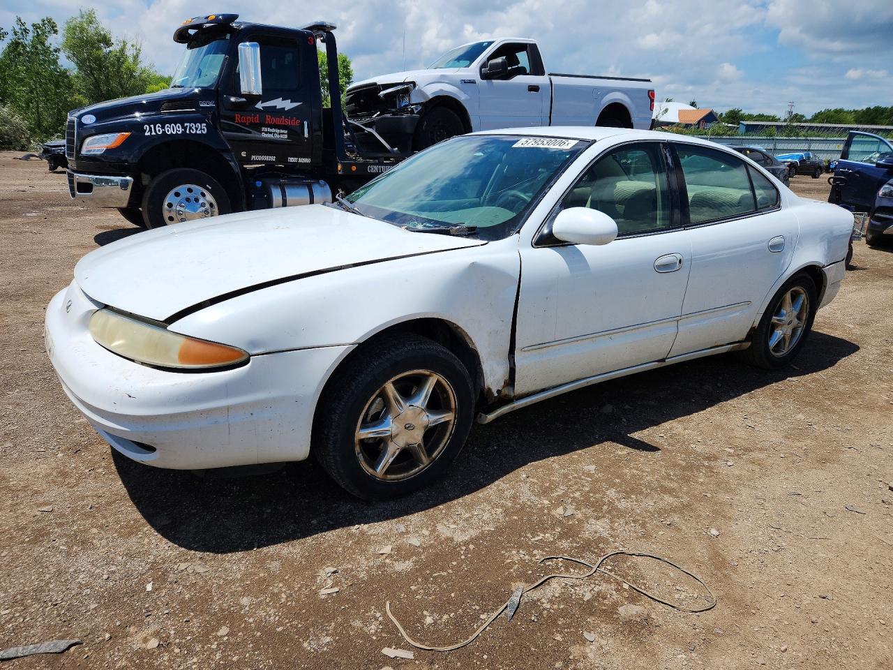 1999 Oldsmobile Alero GLS, VIN 1G3NF52EXXC323264 — Мелкие вмятины и царапины