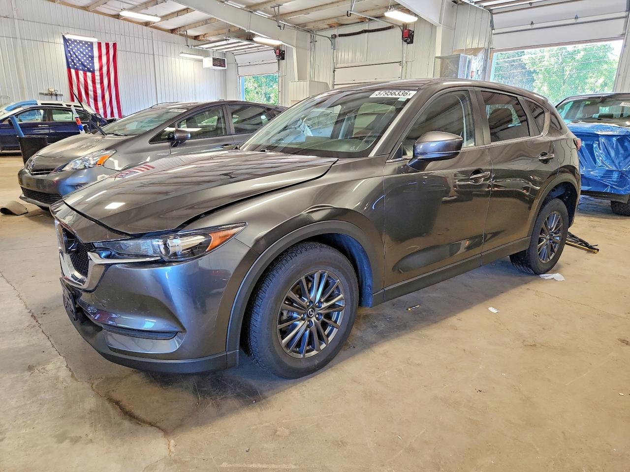 2021 Mazda CX-5 Touring, VIN JM3KFBCM8M0484093 — Front end