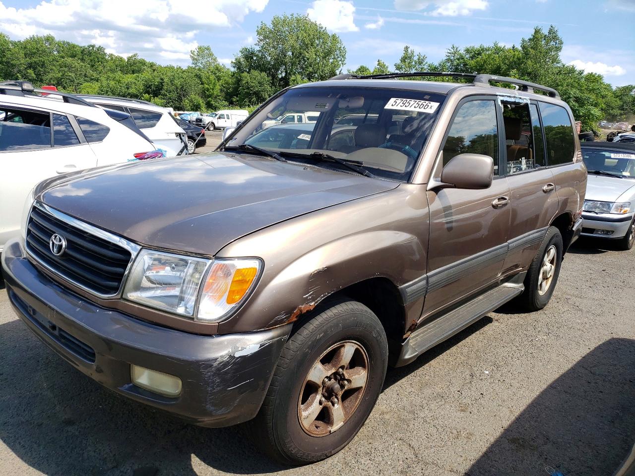 2000 Toyota Land Cruiser, VIN JT3HT05J9Y0097047 — Side
