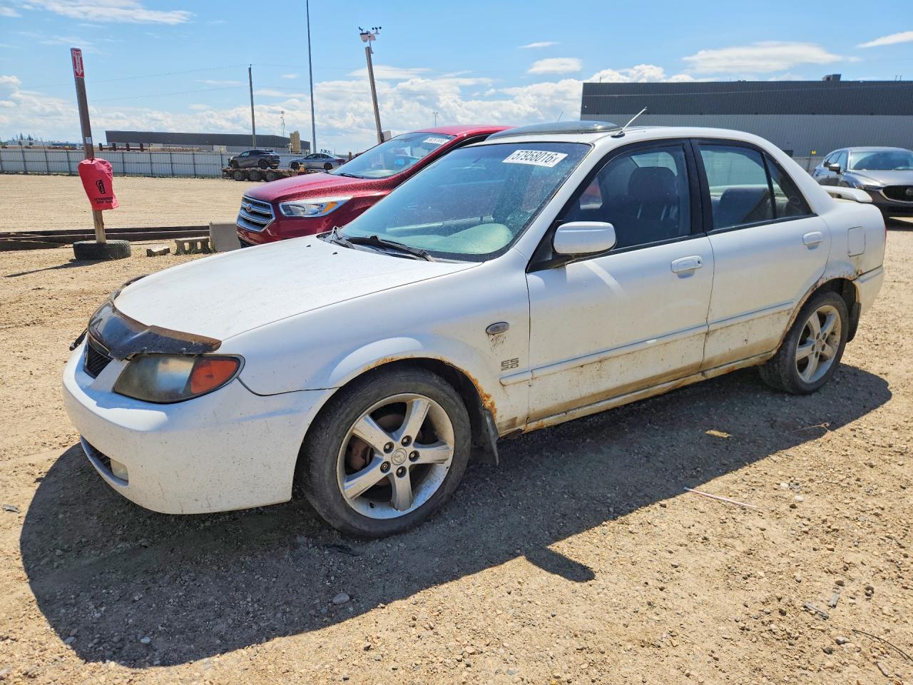 2003 Mazda Protege DX, VIN JM1BJ225131221549 — Механическое