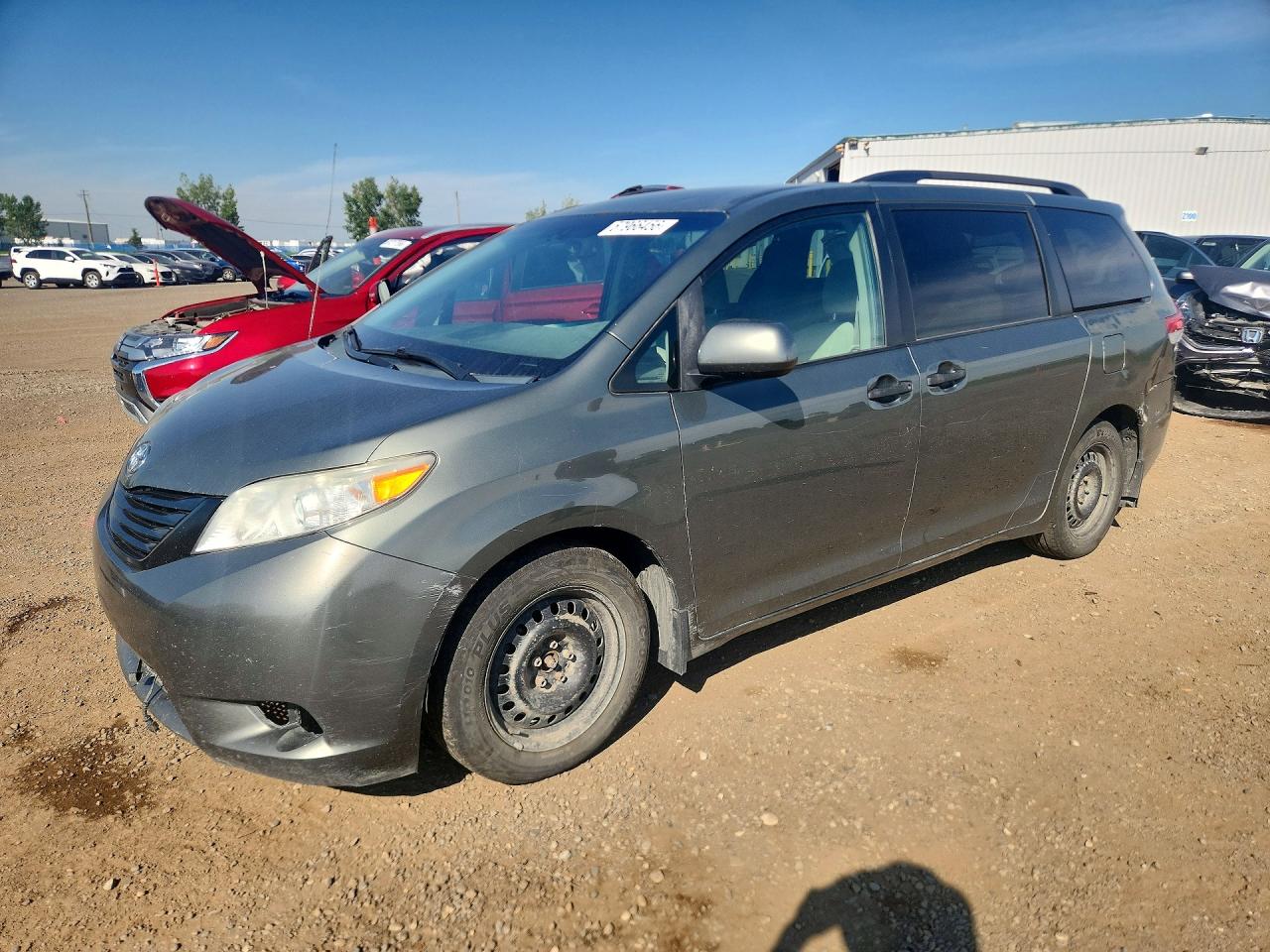 2011 Toyota Sienna, VIN 5TDZK3DC5BS085747 — Side