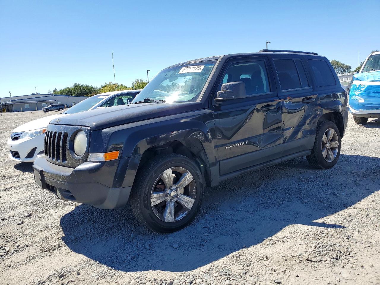 2012 Jeep Patriot Latitude, VIN 1C4NJRFBXCD537584 — Side