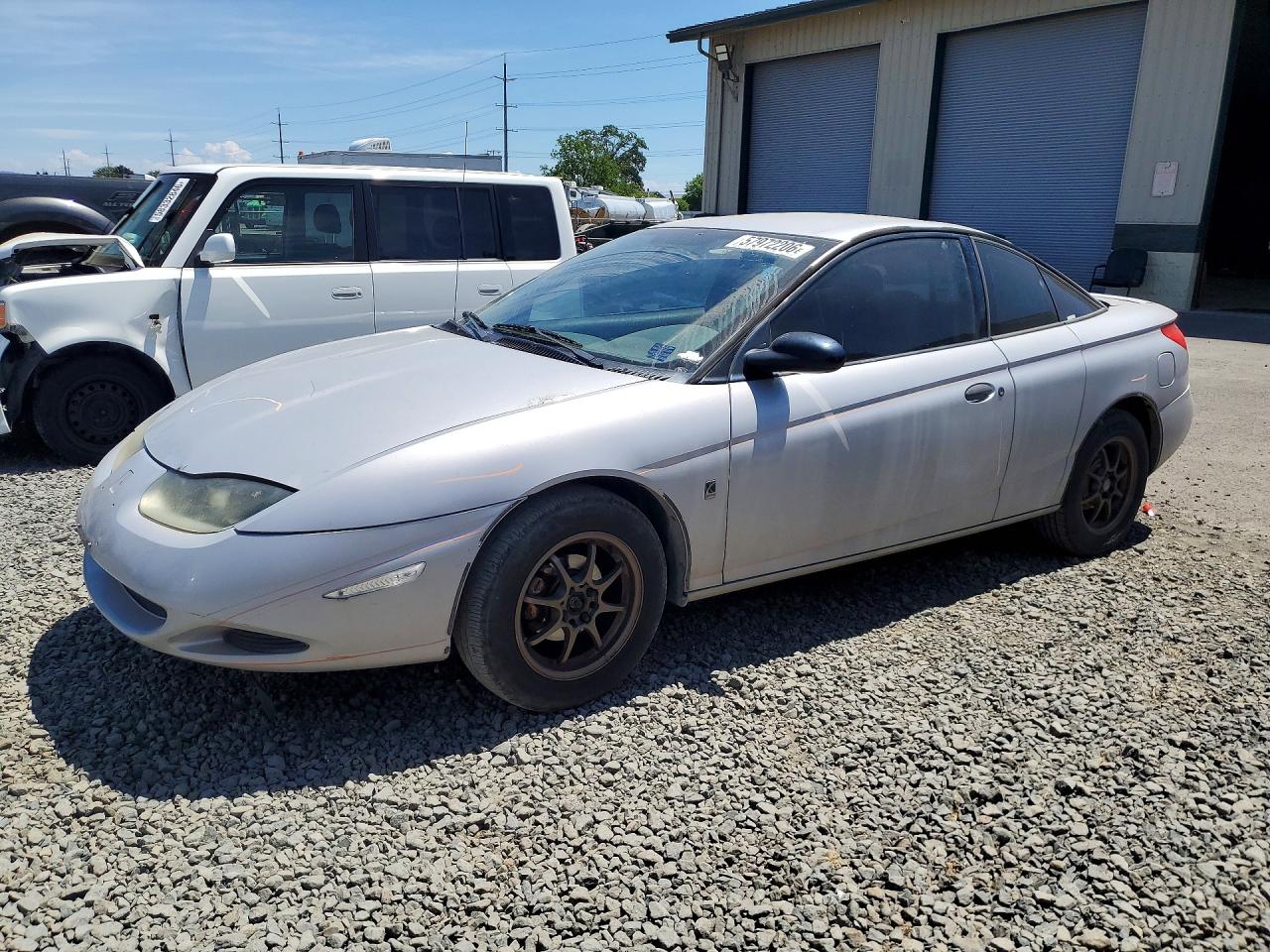 2001 Saturn SC, VIN 1G8ZP12801Z241687 — Undercarriage