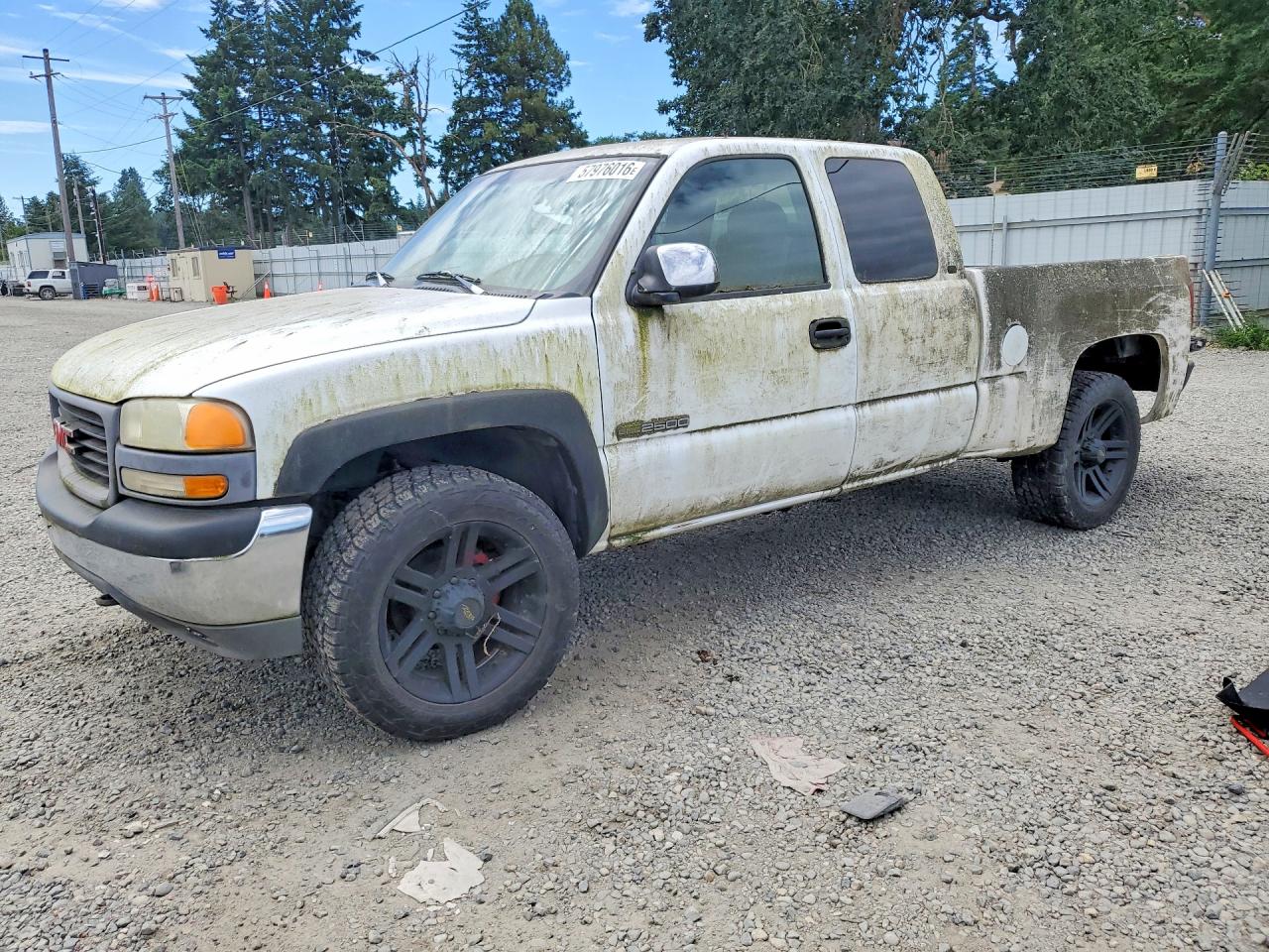 1999 GMC Sierra 2500 SLE, VIN 1GTGK29U5XZ524664 — Minor dents and scratches