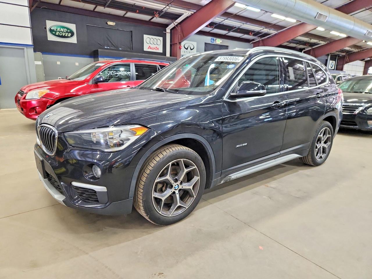 2018 BMW X1 xDrive28i, VIN WBXHT3C36J5K28366 — Minor dents and scratches
