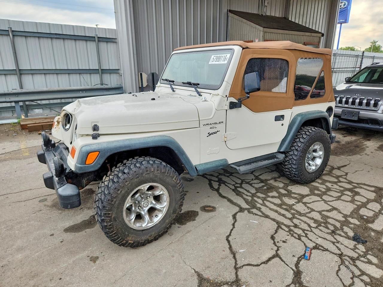 1999 Jeep Wrangler Sport, VIN 1J4FY19S9XP477521 — Front end