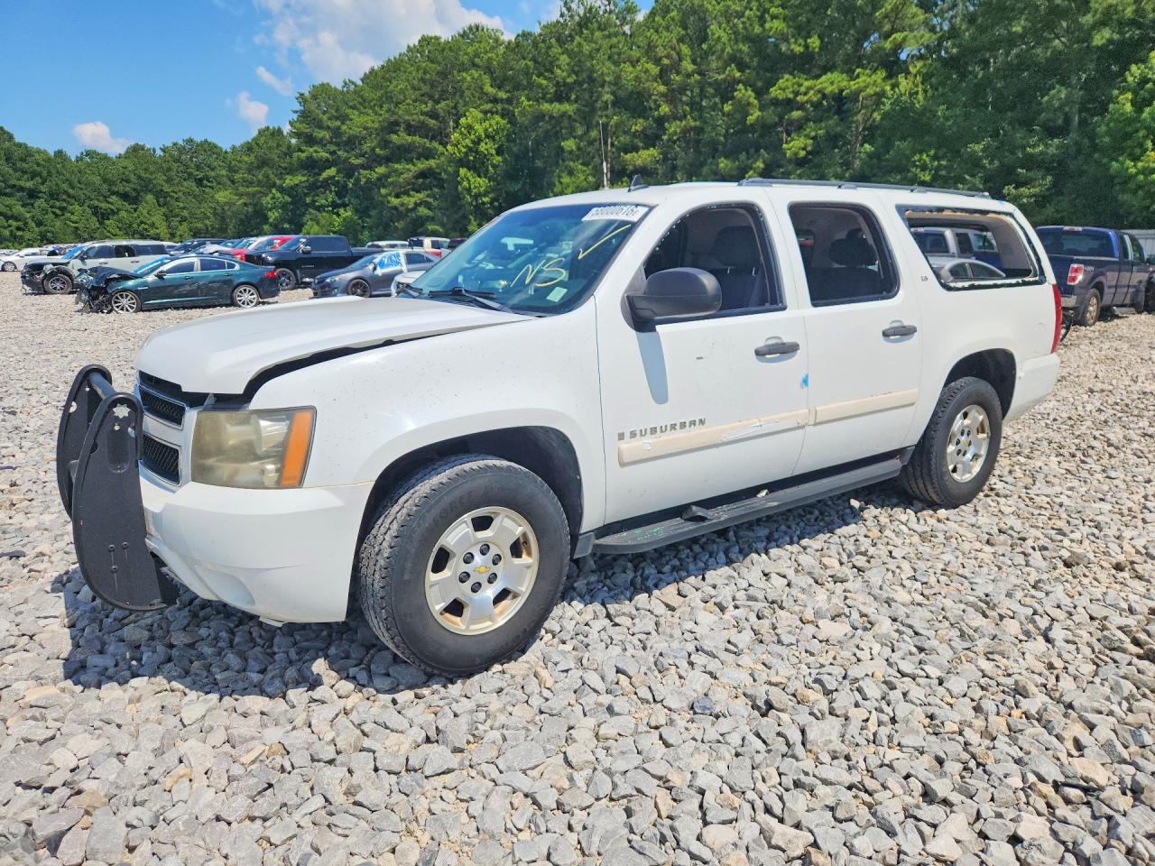 2009 Chevrolet Suburban LS, VIN 1GNFC16049R182025 — Бок