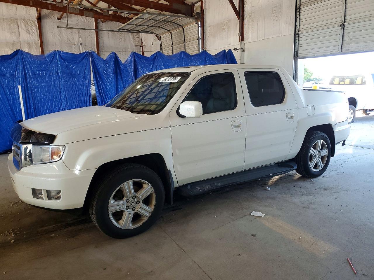 2010 Honda Ridgeline RTL, VIN 5FPYK1F52AB004468 — Front end