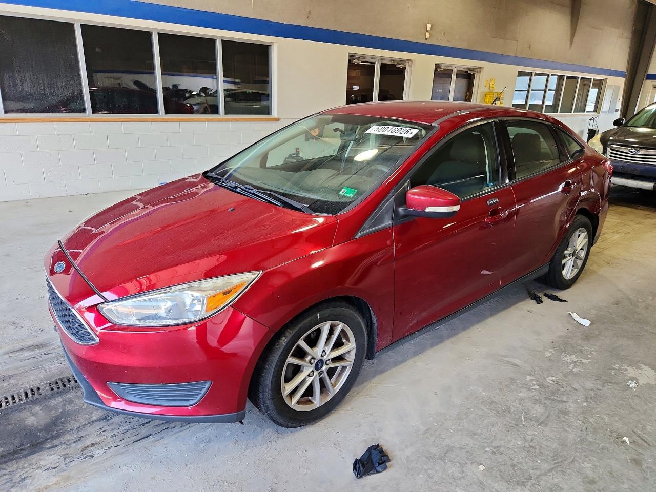 2016 Ford Focus SE, VIN 1FADP3F23GL236194 — Side
