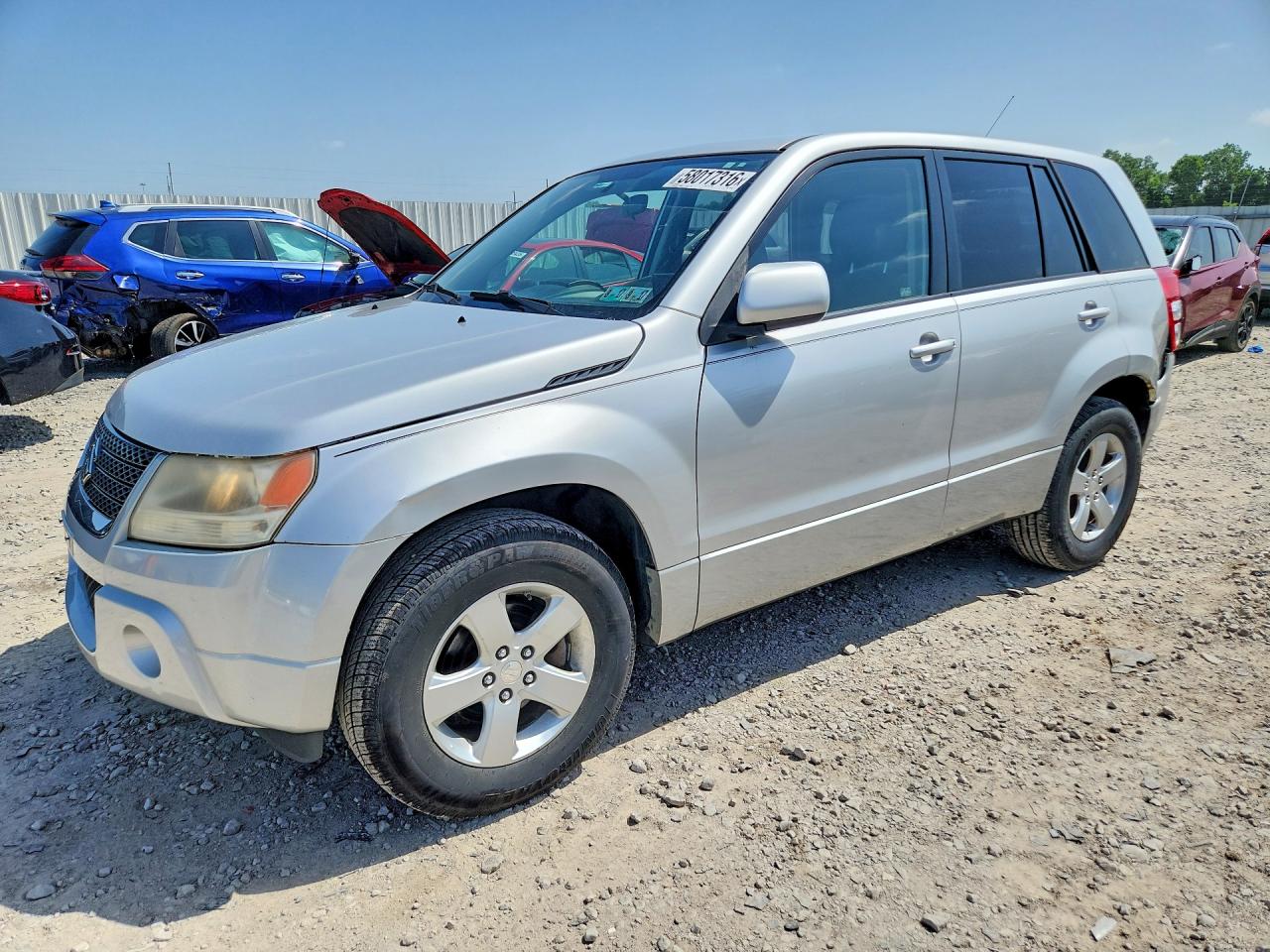 2012 Suzuki Grand Vitara Premium, VIN JS3TE0D64C4100212 — Hail