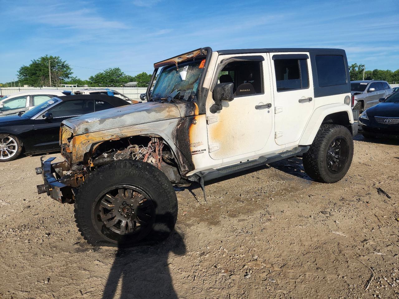2014 Jeep Wrangler Unlimited Sahara, VIN 1C4BJWEG2EL164449 — Engine fire