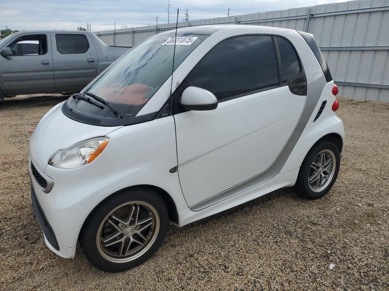 2013 Smart fortwo Pure, VIN WMEEJ3BA4DK690535 — Side