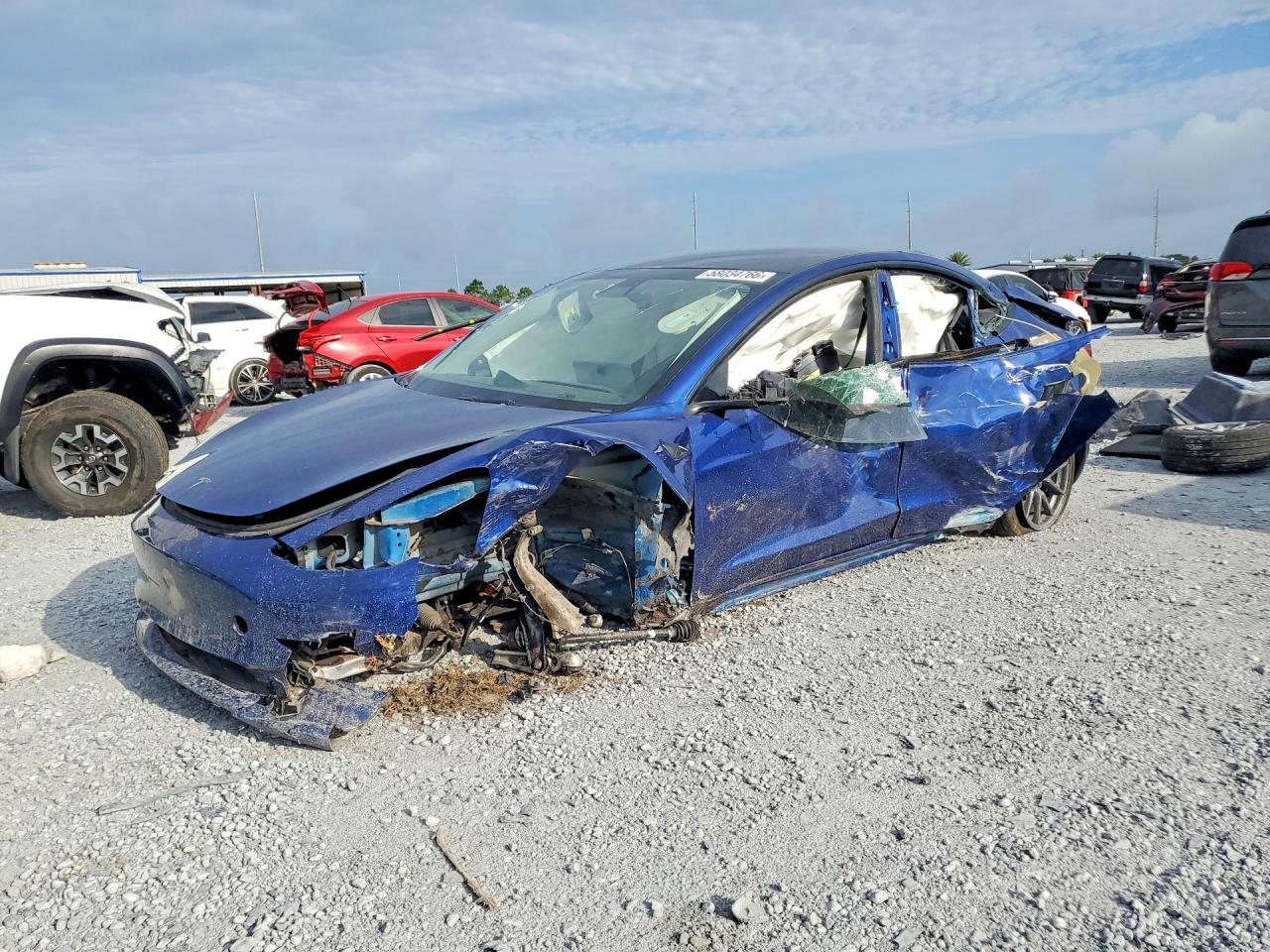 2022 Tesla Model 3 Long Range, VIN 5YJ3E1EB5NF115409 — Опрокидывание