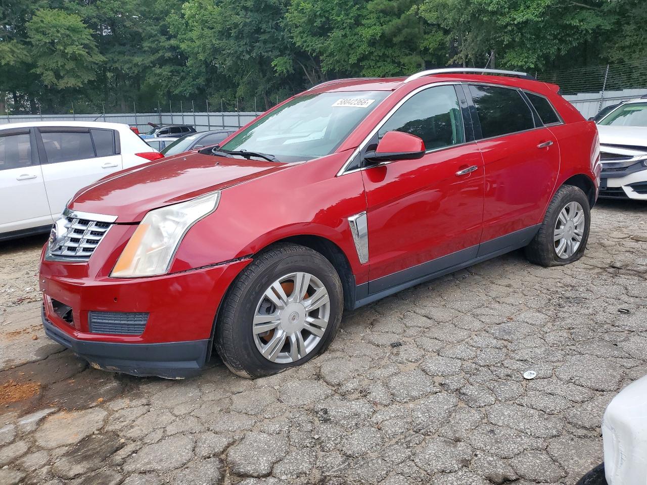 2014 Cadillac SRX Luxury Collection, VIN 3GYFNEE30ES576838 — Vandalism