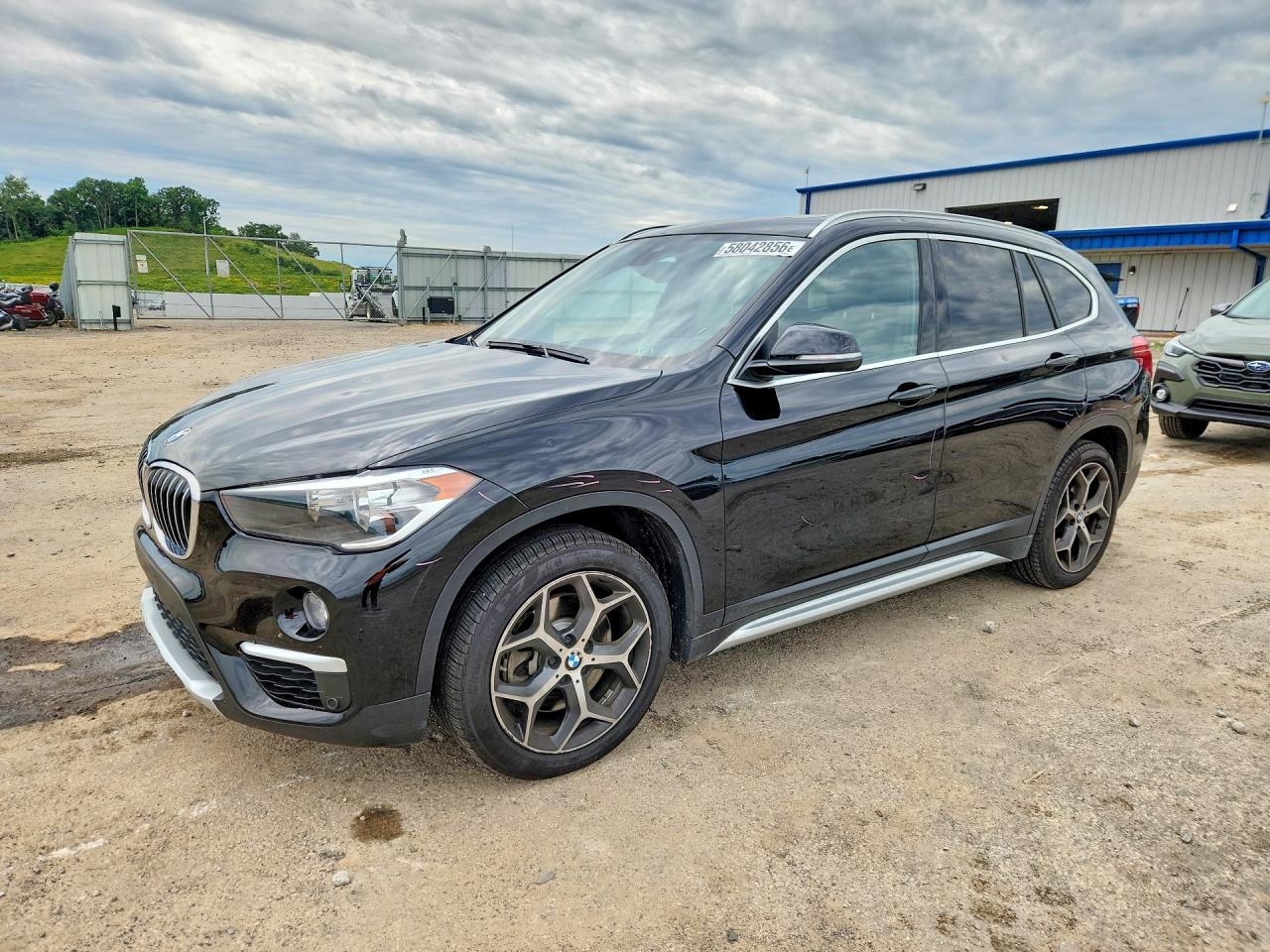 2019 BMW X1 xDrive28i, VIN WBXHT3C50K5N47488 — Hail