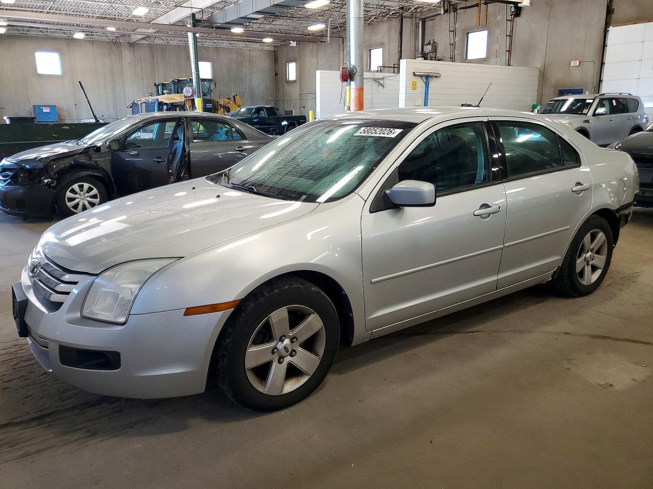 2009 Ford Fusion SE, VIN 3FAHP07Z59R215086 — Зад