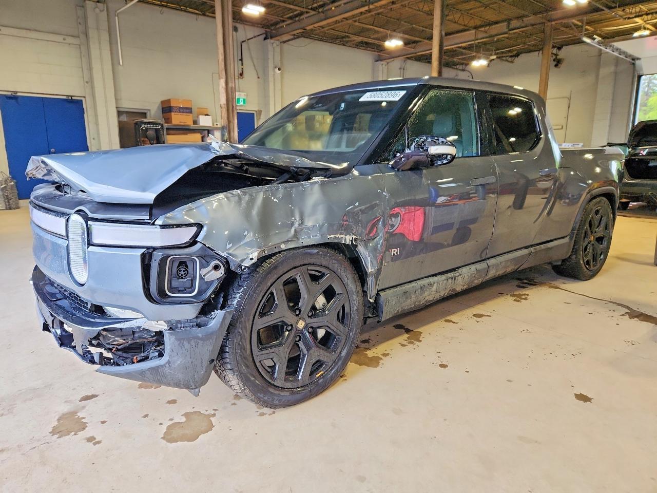 2024 Rivian R1T Adventure, VIN 7FCTGCAAXRN032420 — Front end