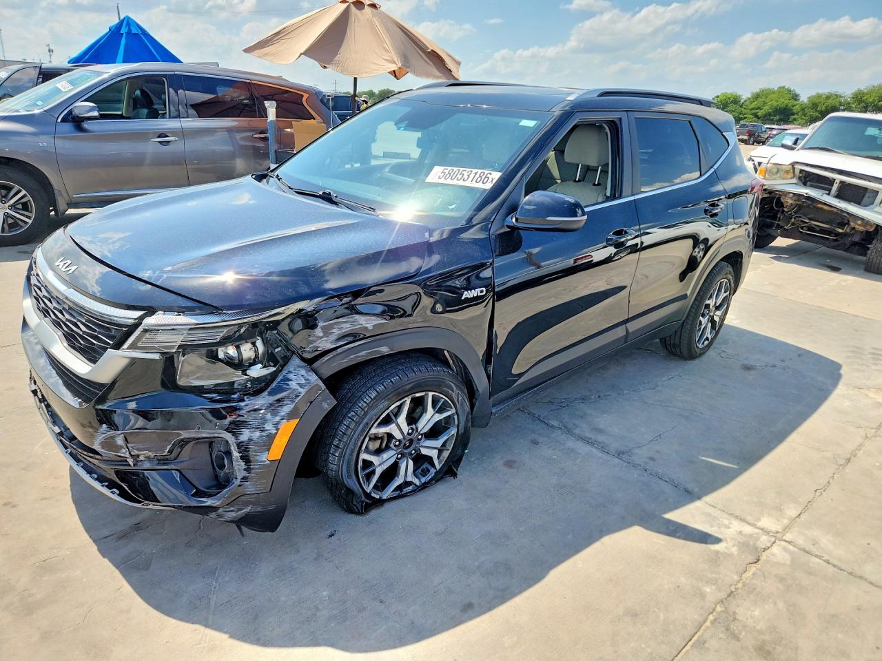 2022 Kia Seltos EX, VIN KNDERCAA7N7307586 — Side