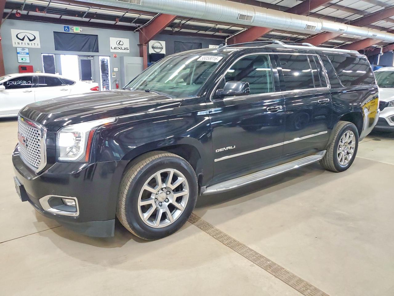 2015 GMC Yukon XL Denali, VIN 1GKS2JKJ3FR239274 — Minor dents and scratches