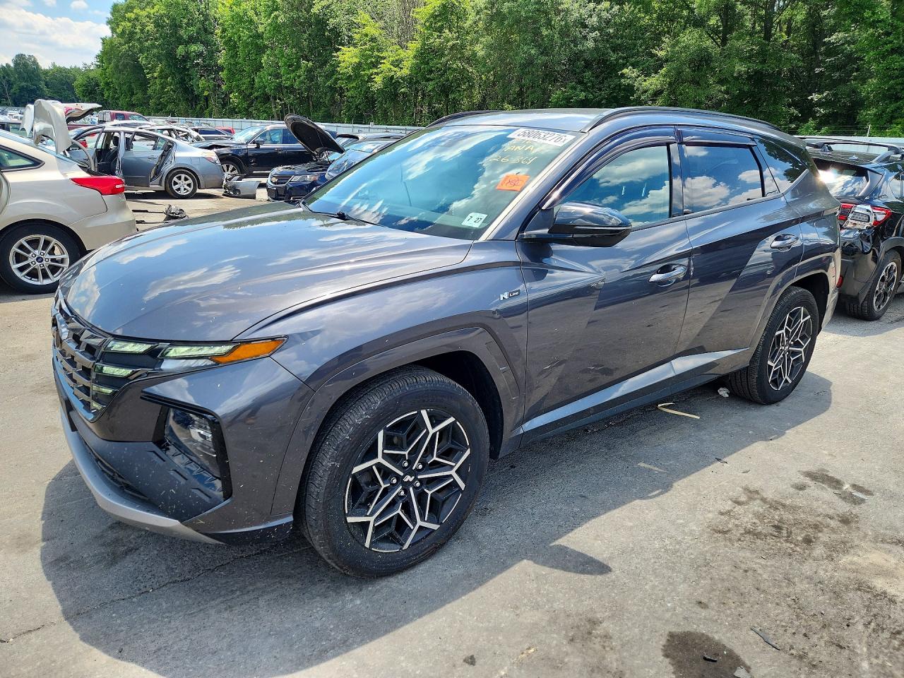 2022 Hyundai Tucson N Line, VIN KM8JFCAE9NU152305 — Бок