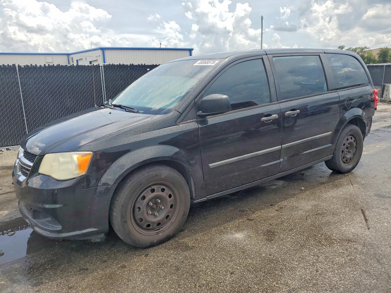 2013 Dodge Grand Caravan SE, VIN 2C4RDGBG9DR796211 — Зад