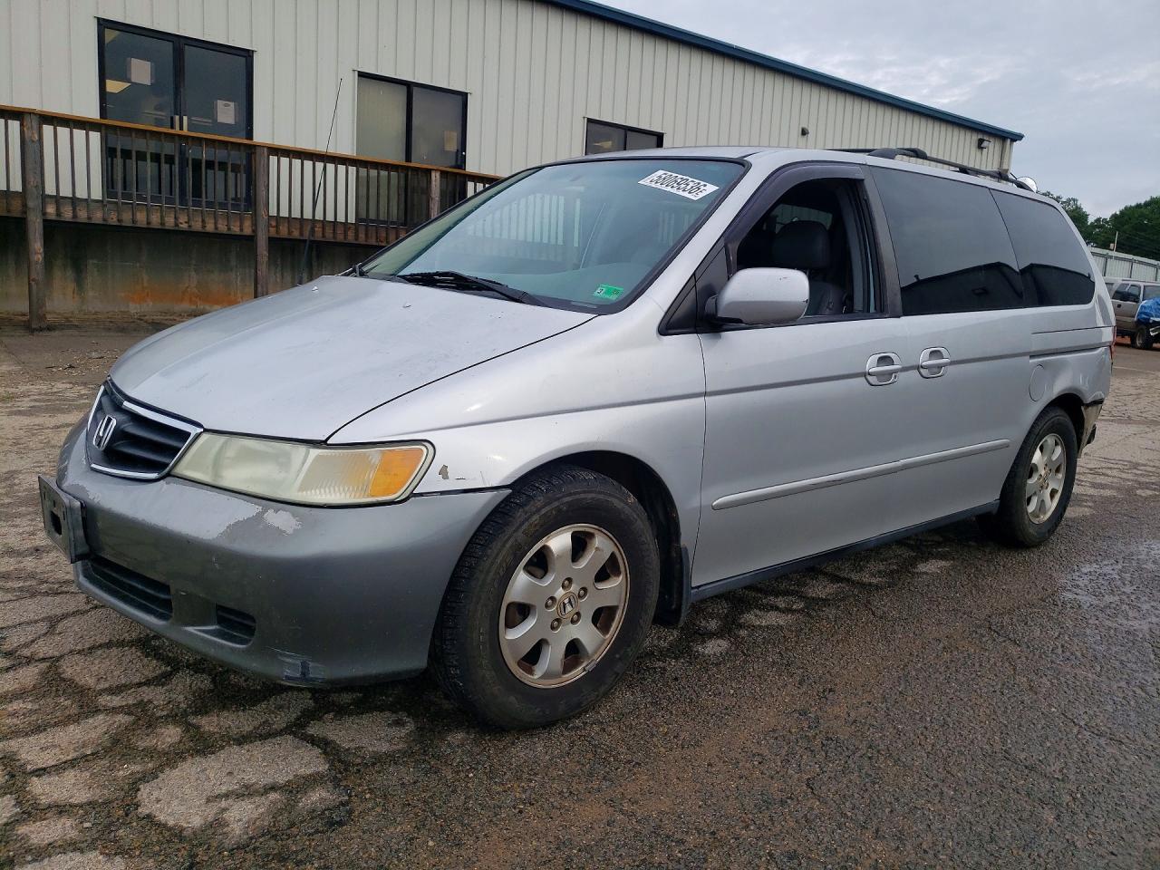 2004 Honda Odyssey EX-L, VIN 5FNRL18964B046639 — Зад