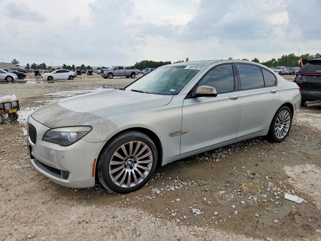 2011 BMW 7 Series 740i, VIN WBAKA4C56BC612674 — Minor dents and scratches
