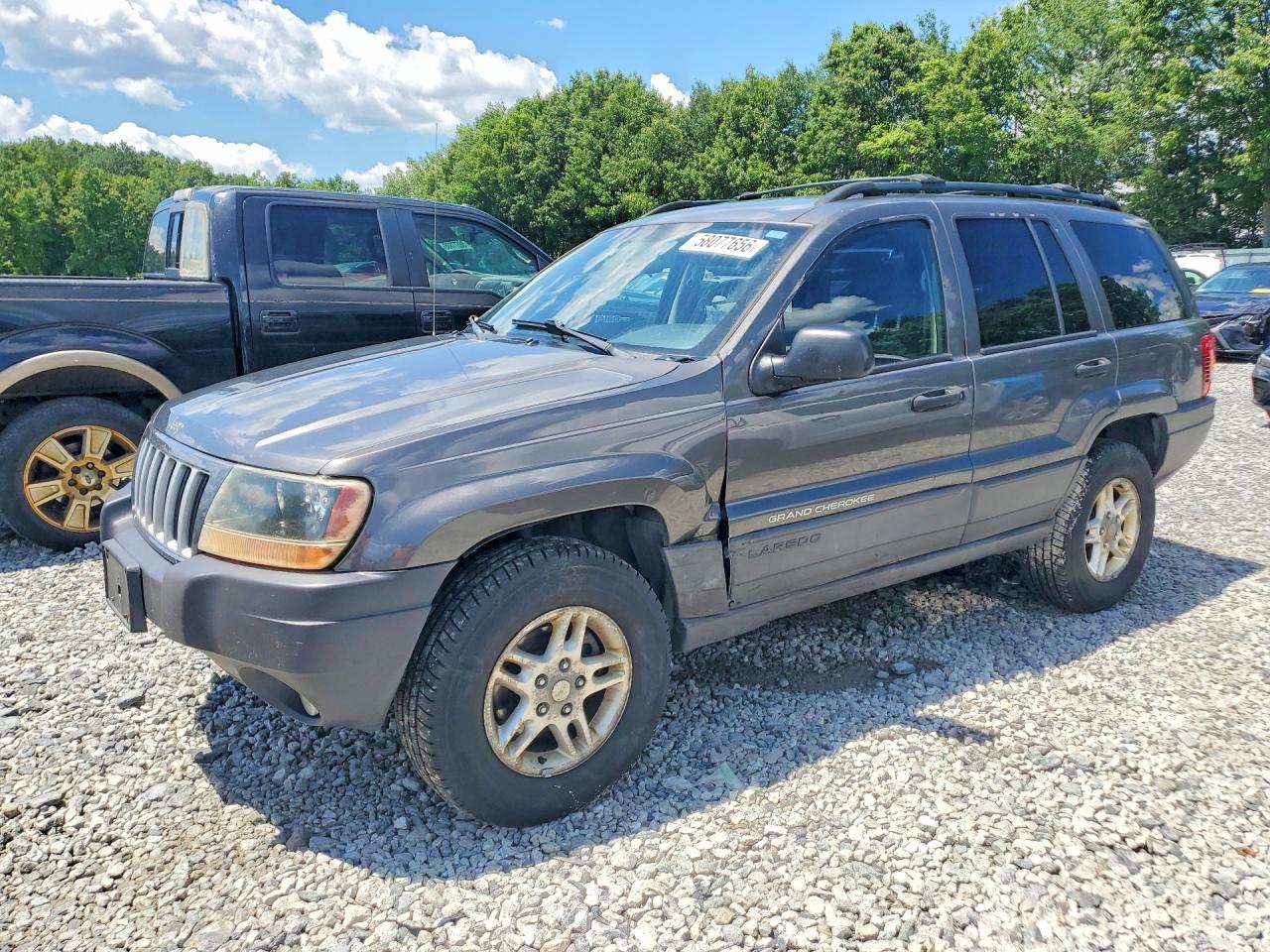 2004 Jeep Grand Cherokee Laredo, VIN 1J4GW48SX4C318877 — Side