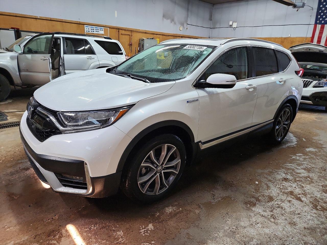 2021 Honda CR-V Touring, VIN 7FART6H95ME013956 — Minor dents and scratches