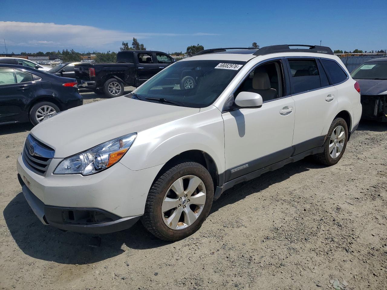 2012 Subaru Outback Limited, VIN 4S4BRDLCXC2254069 — Side