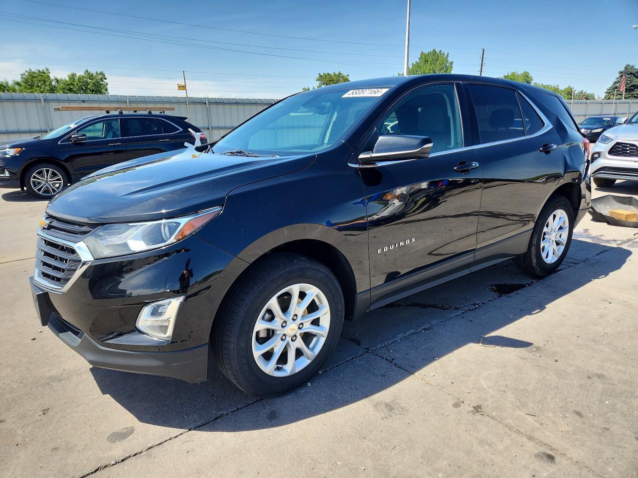 2018 Chevrolet Equinox LT, VIN 2GNAXSEV8J6322126 — Rear end