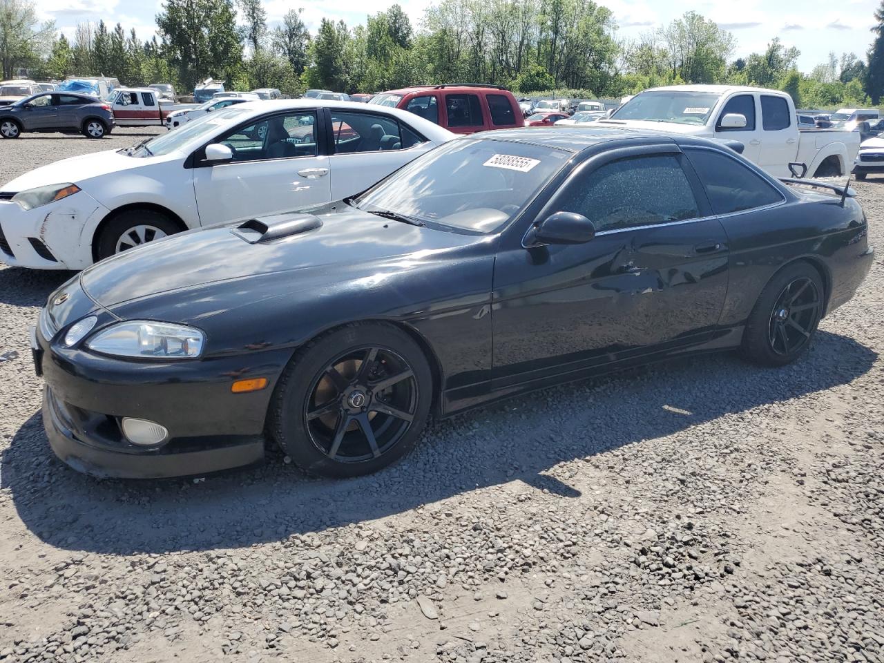1997 Lexus SC 400, VIN JT8CH32YXV0052087 — Side