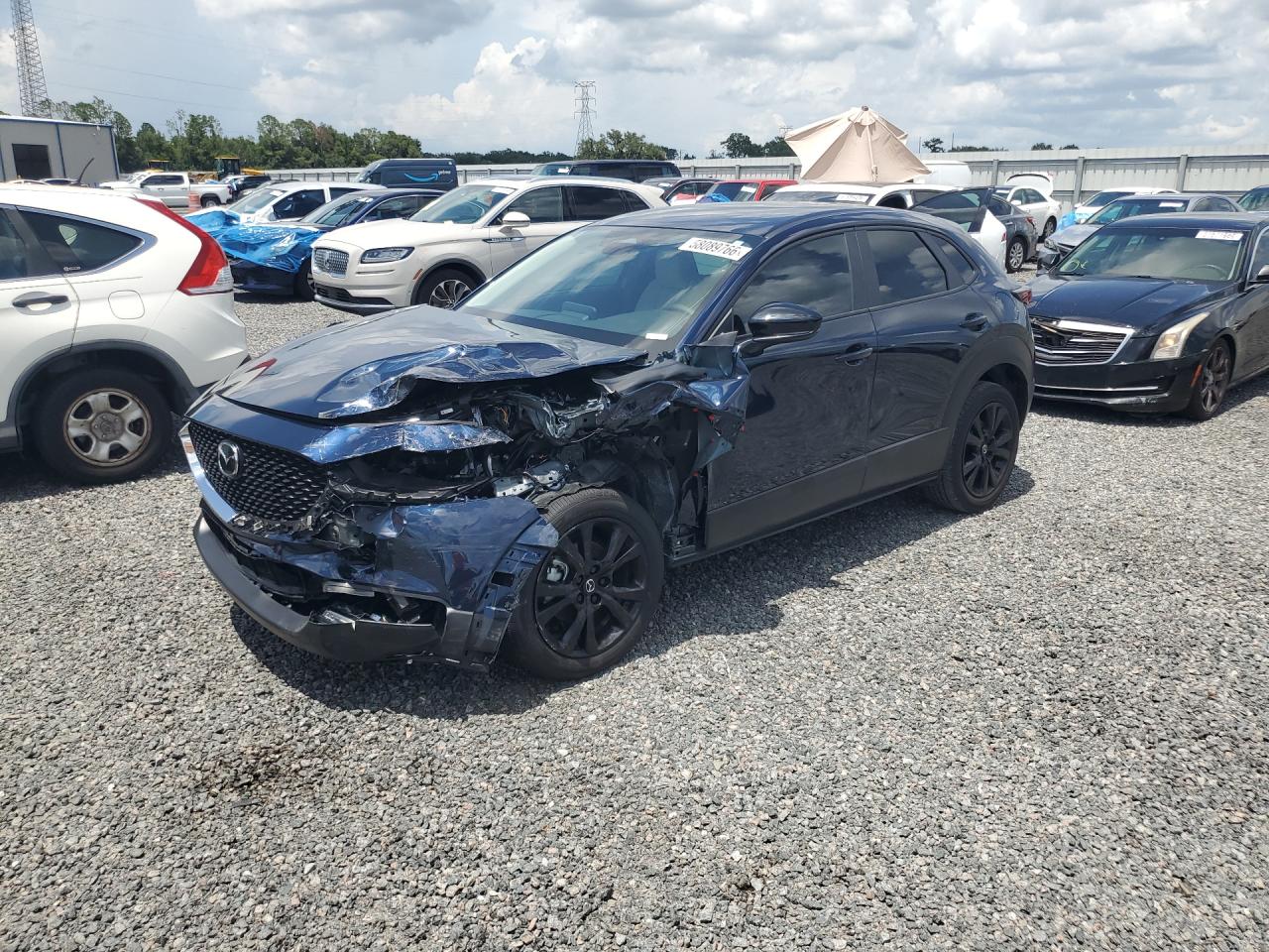 2026 Mazda CX-30 S Select Sport, VIN 3MVDMBBL8TM137079 — Front end