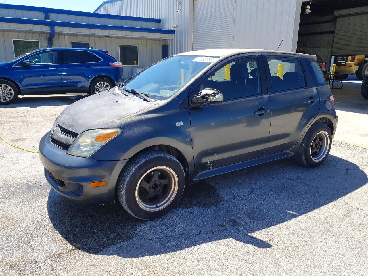 2006 Scion xA, VIN JTKKT604X65007516 — Side