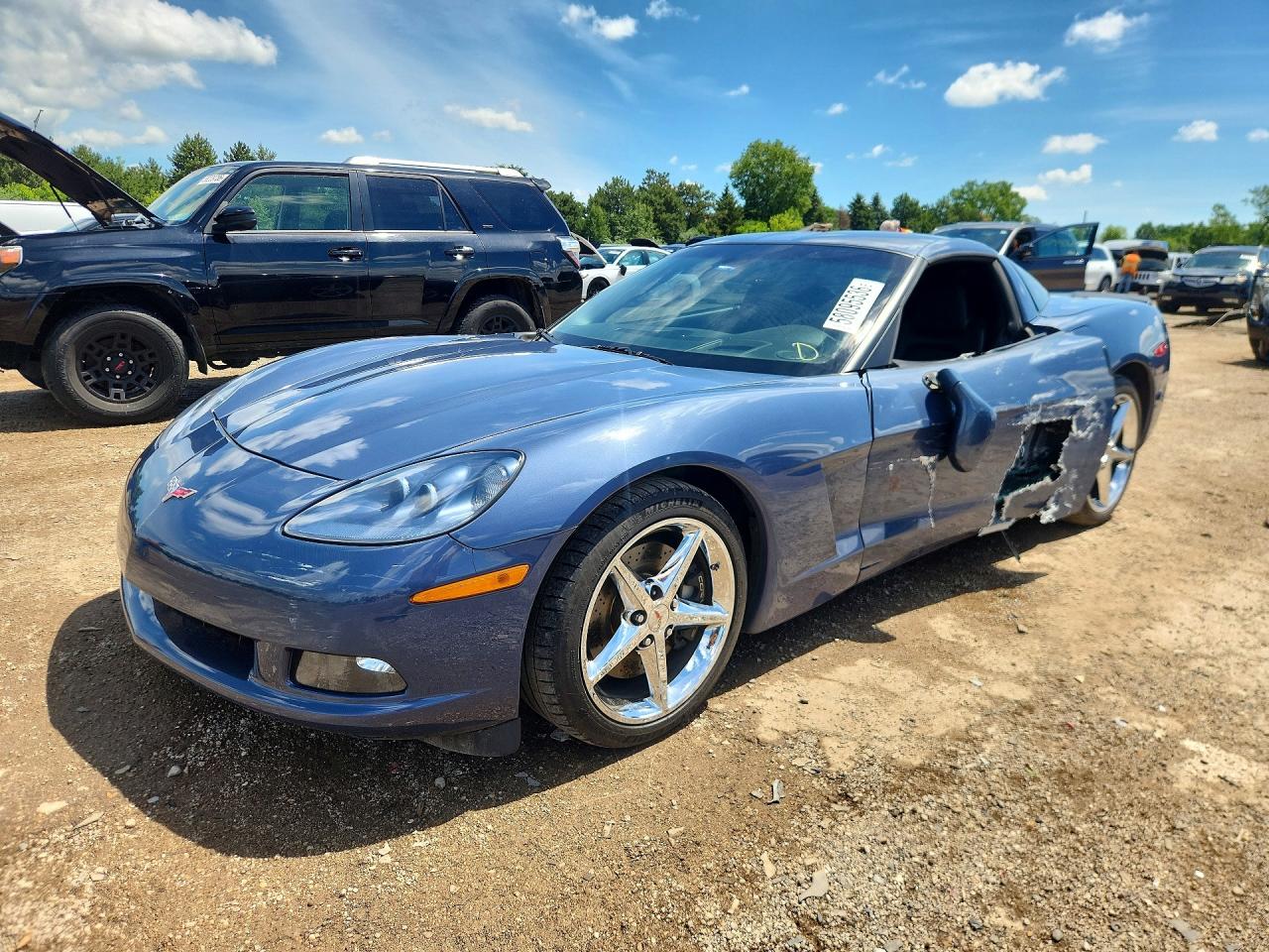 2013 Chevrolet Corvette 3LT, VIN 1G1YG2DW7D5100185 — Side