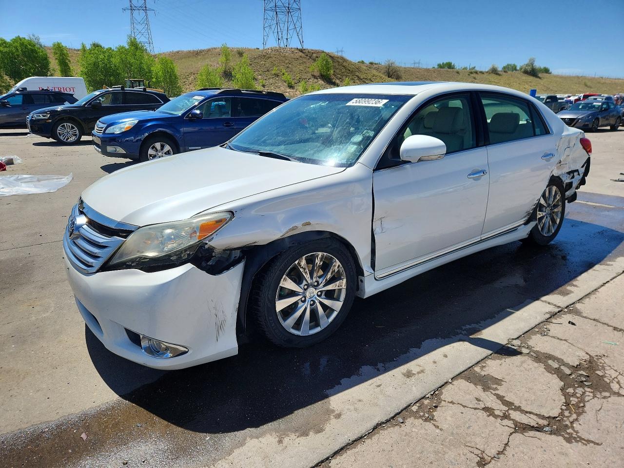 2011 Toyota Avalon Limited, VIN 4T1BK3DB4BU413823 — Side