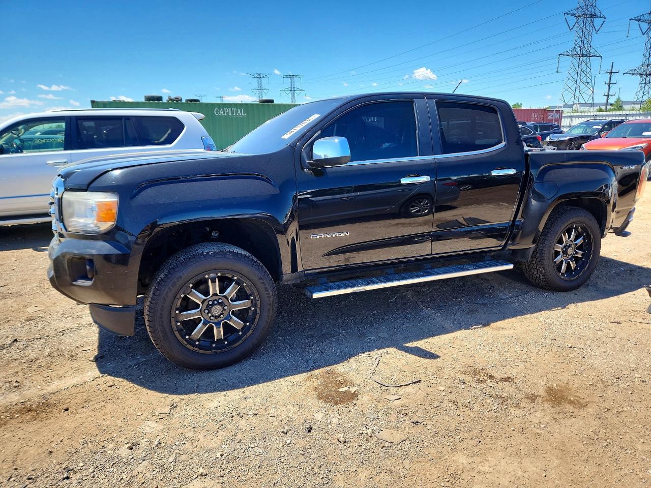 2015 GMC Canyon 4WD SLT, VIN 1GTG6CE33F1218535 — Rear end