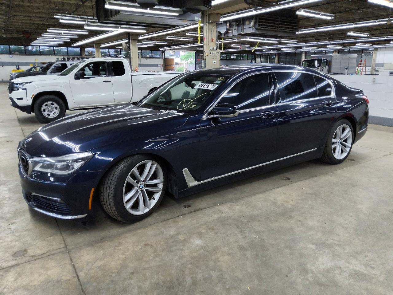 2016 BMW 7 Series 750i xDrive, VIN WBA7F2C53GG418261 — Hail