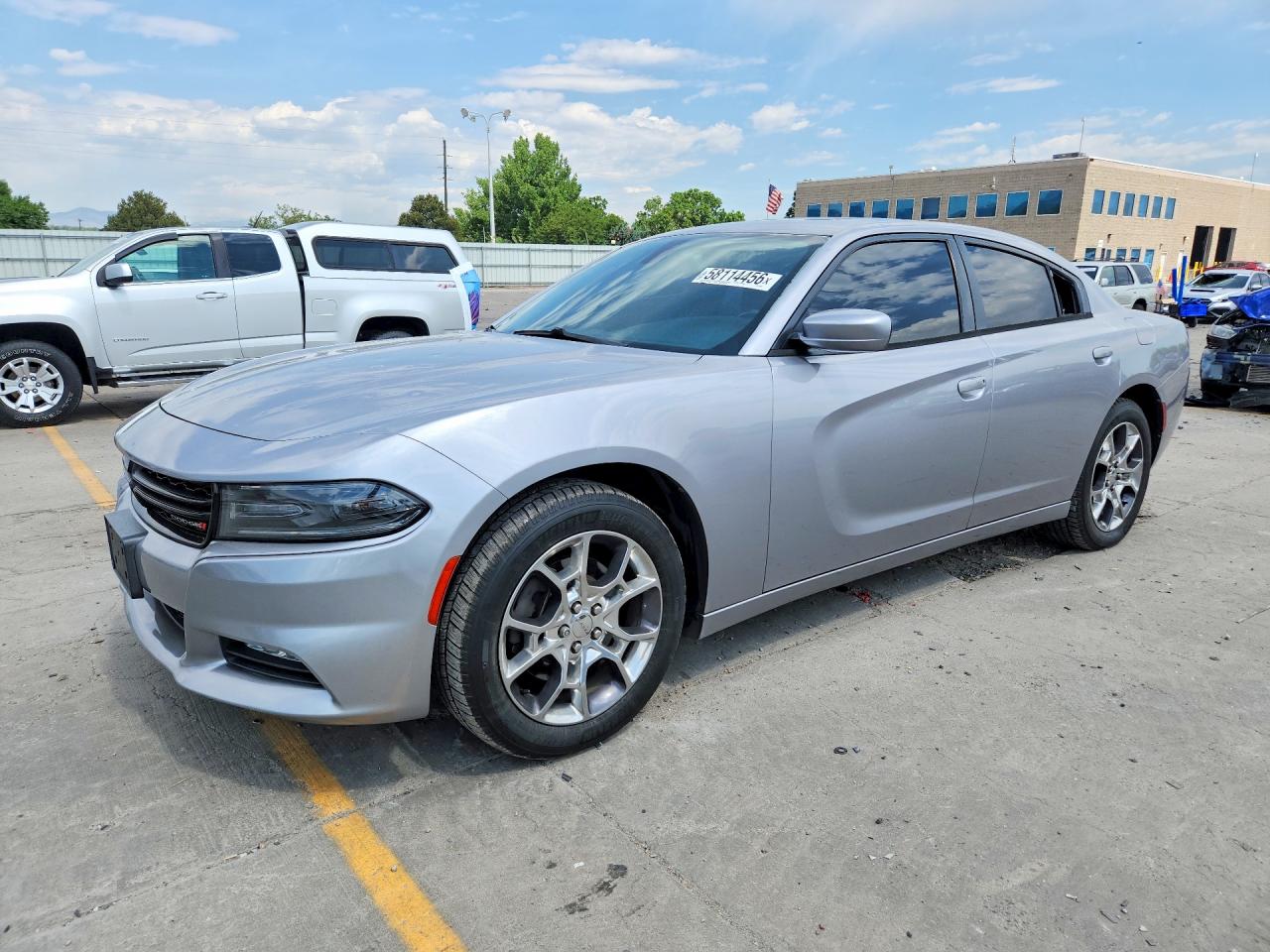 2015 Dodge Charger SXT, VIN 2C3CDXJG3FH828011 — Hail