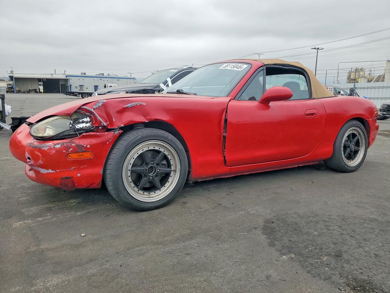 1999 Mazda MX-5 Miata, VIN JM1NB3532X0100101 — Front end